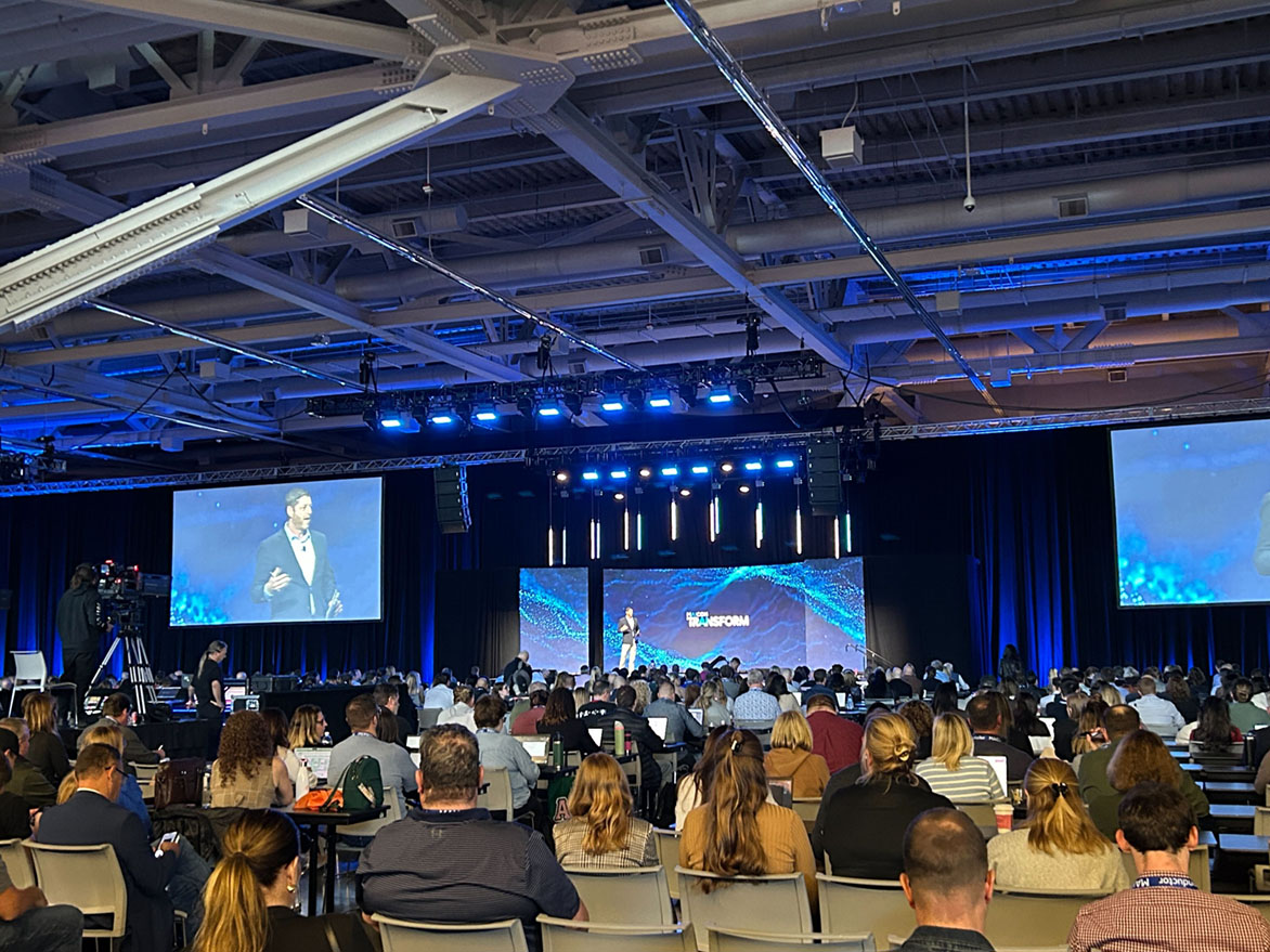 Photo from the Maicon Conference with attendees watching